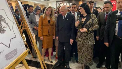 MHP lideri Bahçeli, “Yeni Yüzyılın Kara Kalem Sergisi”ne katıldı